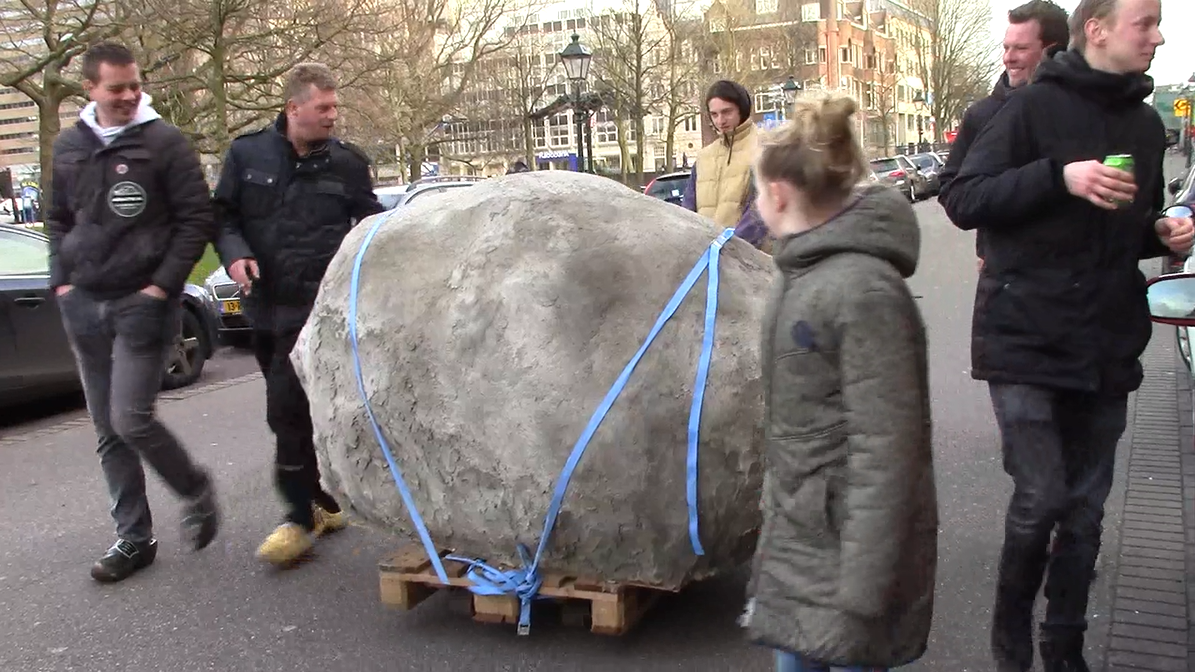 screenshot of video documentation of the tranportation of the rock